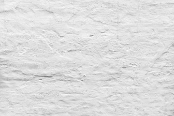 Obraz premium Rough concrete wall with white plaster