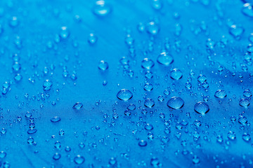 Rain Water droplets on blue  background