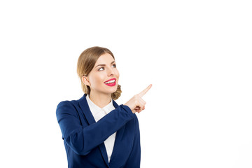Happy elegant woman pointing to the right. White isolated background.