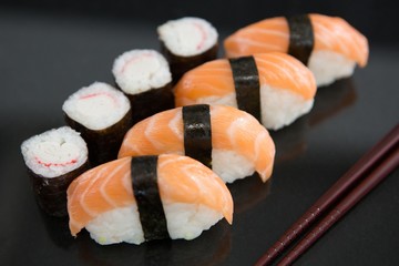 Sushi with chopsticks