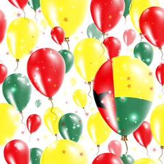 Guinea-Bissau Independence Day Seamless Pattern. Flying Rubber Balloons in Colors of the Guinea-Bissauan Flag. Happy Guinea-Bissau Day Patriotic Card with Balloons, Stars and Sparkles.