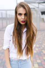 Young pretty hipster girl in the city,  lifestyle people concept