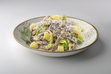Bowl with portion of pizzoccheri