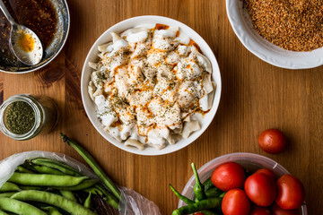 Turkish Manti Manlama / Ravioli with yogurt and fried butter sauce.