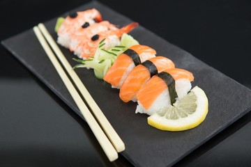 Sushi with chopsticks