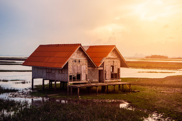 Dilapidated of house in lagoon at Talaynoi, Phattalung province, Thailand.