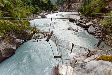 Broken Suspension Bridge in Himalayas Nepal