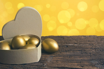 golden eggs on heart box