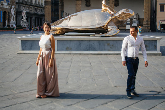 Golden turtle - sculpture "Searching for Utopia" by Belgian artist Jan Fabre on the Piazza della Signoria in Florence.