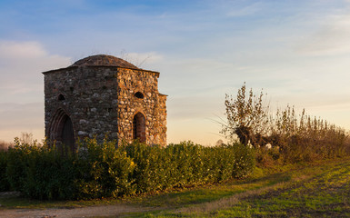 Little old church or chapel in the italian countryside in an autumn evening.