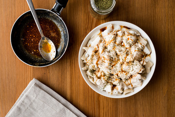 Turkish Manti Manlama / Ravioli with yogurt and fried butter sauce.