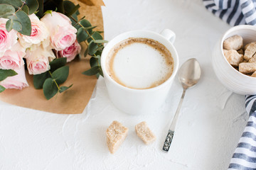 Romantic feminine background with coffee and roses