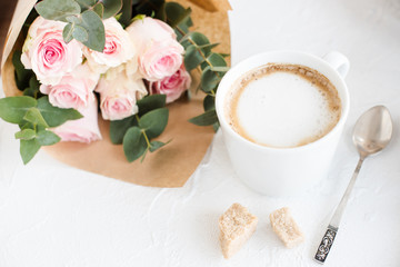 Romantic feminine background with coffee and roses