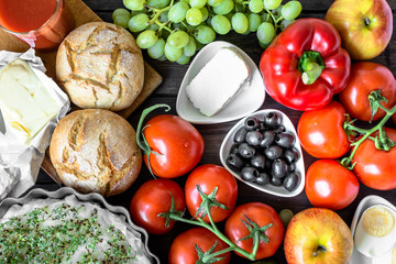 Obraz na płótnie Canvas Healthy breakfast ingredients of vegetarian food, fruits and vegetables, flat lay
