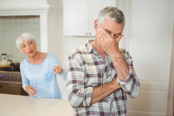 Senior couple quarrelling with each other