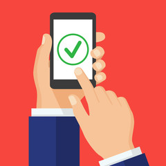 Green check mark icon on smartphone screen.