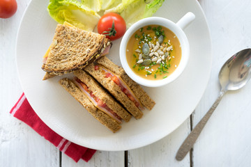 lunch dinner plate fresh cut sandwich ham cheese cup bowl vegetable creamy soup garnish seeds