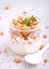 healthy breakfast: yogurt with muesli in jars