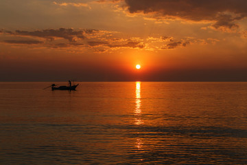 Fototapeta na wymiar Fishermen are fishing, silhouette people activities at sea and beach..