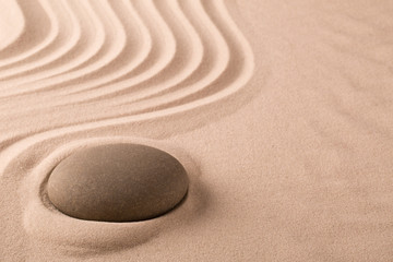 zen meditation stone and sand garden. Concept background for harmony spirituality and spirituality. Yoga or spa wellness background..