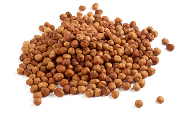 Heap of hazelnuts on white
