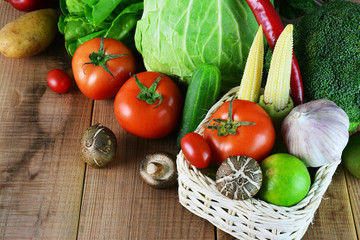 Vegetables on wooden table.