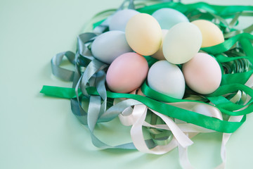 Colorful easter eggs in nest  from tapes