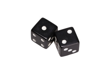 Two dice showing one and two