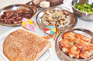 Clean Monday food - lagana bread - seafood - greek halvah and decorative kites