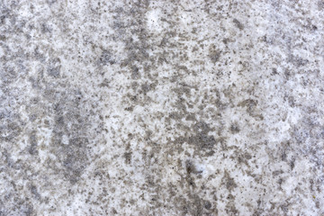 Dirty background of ground with snow in winter