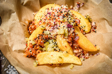 Fried potato wedges in bowl