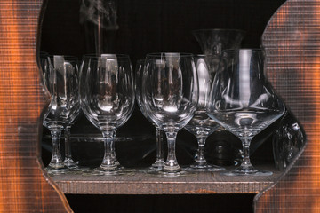 Crystal wine glasses arranged in a cupboard