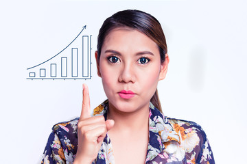 Young pretty woman pointing at increasing bar graph