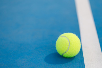 Tennis Ball Close up with Court Lines