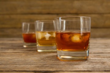 Three glasses of whiskey
