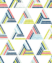 Abstract seamless pattern of a plurality of triangles and stripes. Textured background.