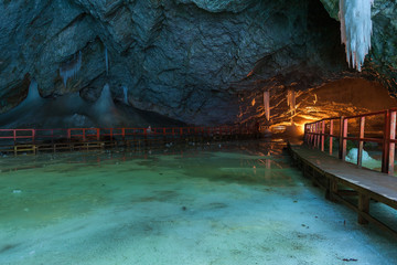 Ice cave -  Scarisoara Cave in the Apuseni Mountains, Romania