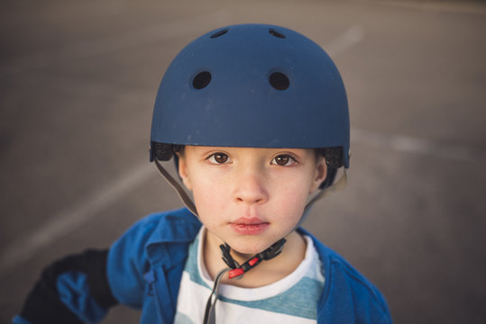 Portrait of cute boy wearing helmet