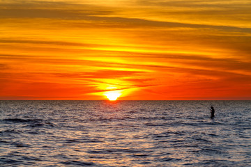 sunset with fisherman