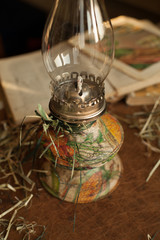 Handmade decupage oil lamp with vegetables print in vintage style.