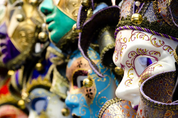 Venetian masks in store display in Venice.