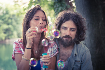 couple at the park with dog