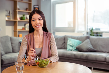 Young beautiful woman in cafe