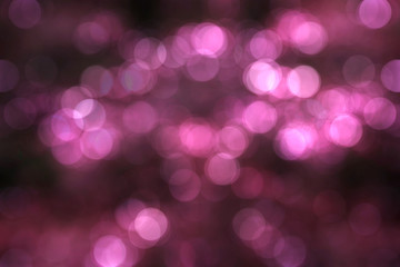 Bokeh light of ilumination night background in pink concept.