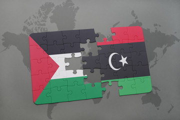 puzzle with the national flag of palestine and libya on a world map
