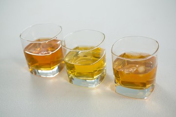 Three glasses of whiskey