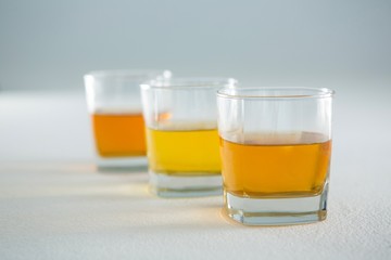 Three glasses of whiskey