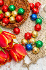 red tulips on wooden background