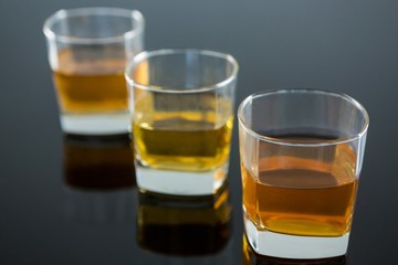 Three glasses of whiskey