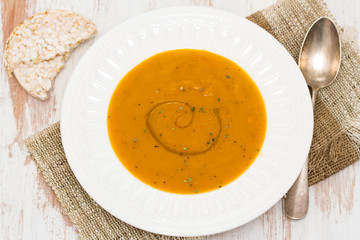 vegetable soup with oil on white dish